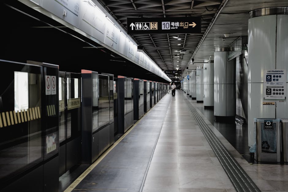 The sleek, futuristic platform of the Shanghai Maglev station at Pudong Airport.
