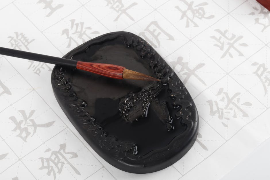 The Chinese characters for Shanghai (上海) written in traditional calligraphy ink style.