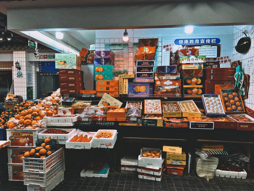 A vibrant display of vegetables and fruits at a local Shanghai wet market.