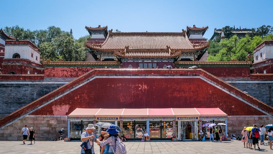 Tourists crowding the entrance of a popular Beijing attraction